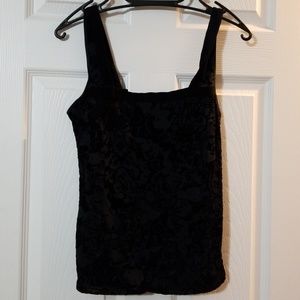 Black top with velvet flower design